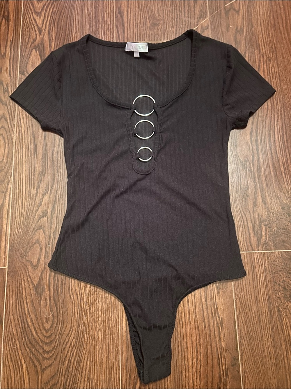 Ribbed Black Short-Sleeve Bodysuit with Triple O-Ring Detail
